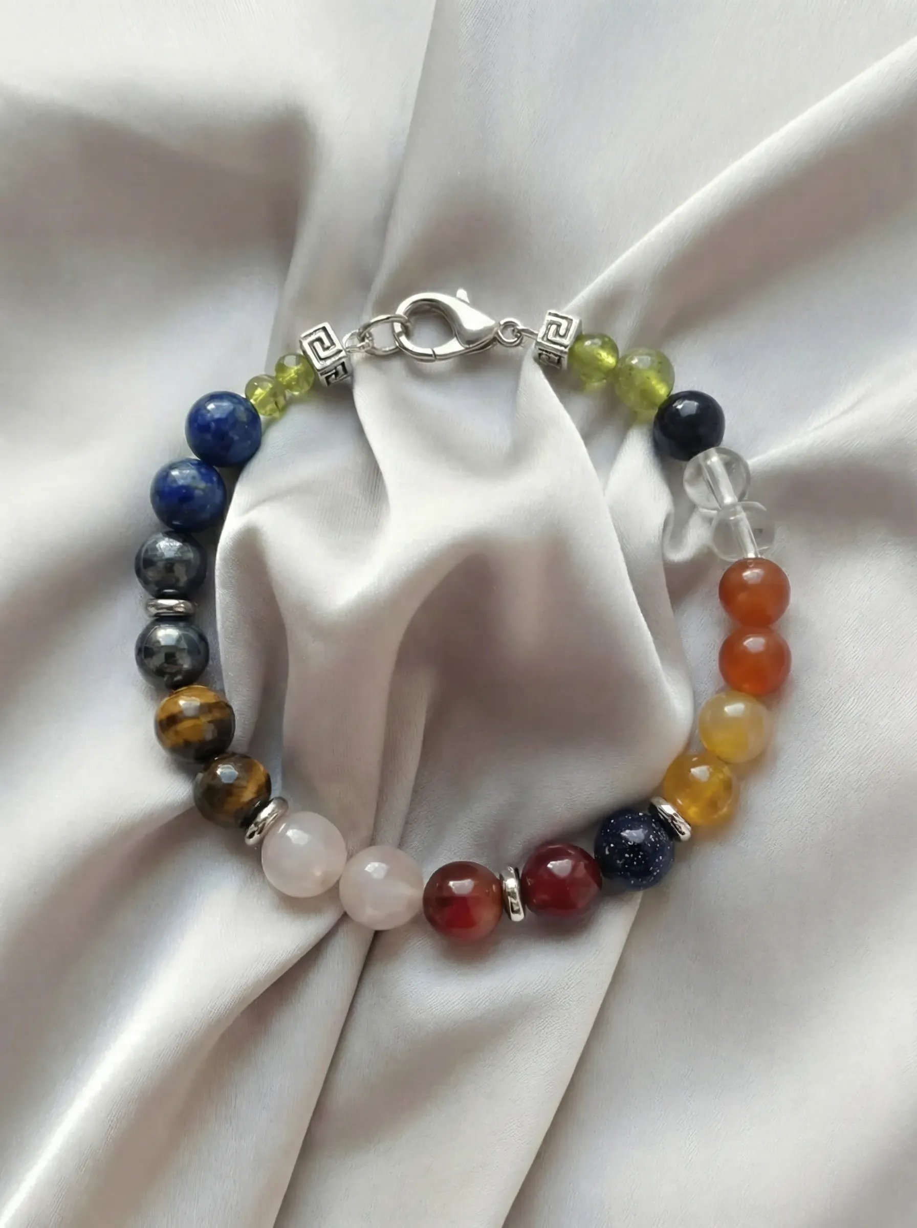 Bracelet placed on a fabric setting.
